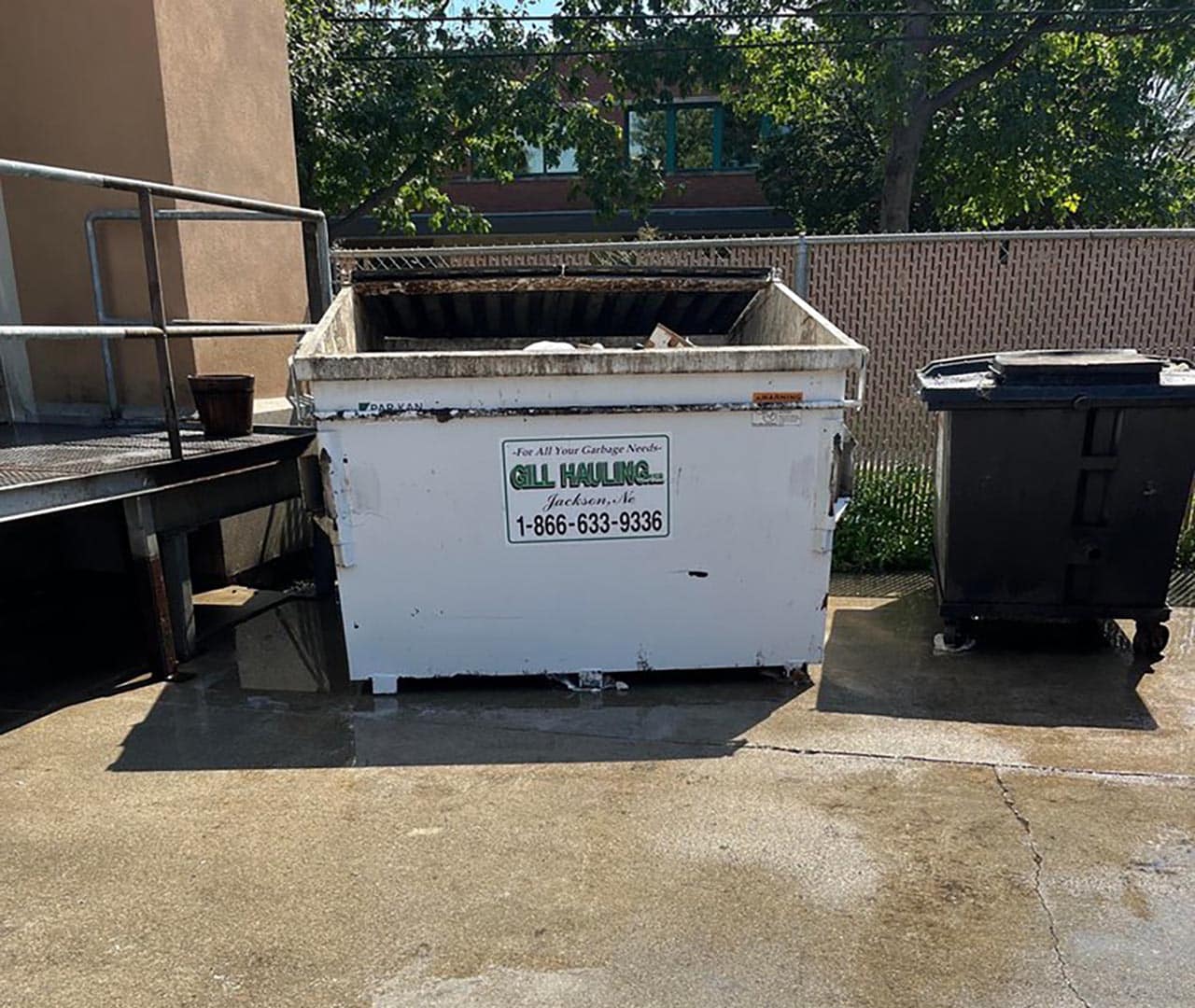 After pro clean mobile wash power washed this garbage dumpster.