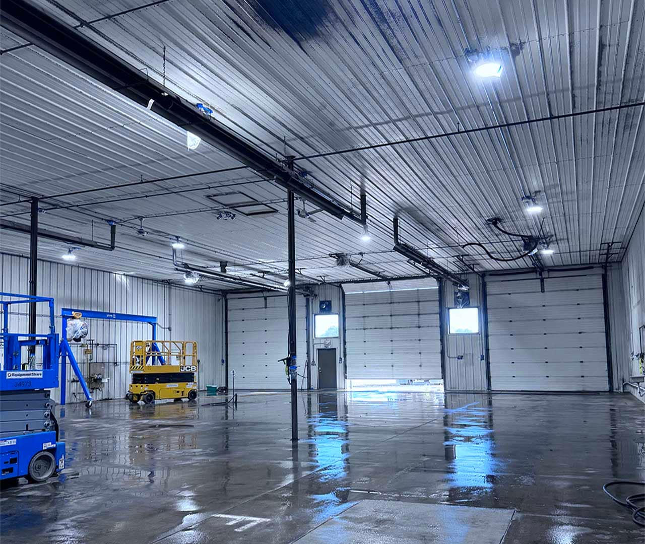 After pro clean mobile wash power washed this commercial garage.